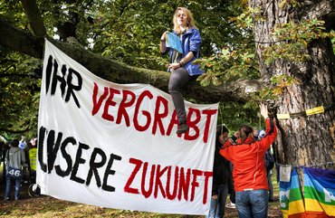 Frau hat's auch gewusst: Baumbesetzung gegen S21, 2010. Foto: Martin Storz