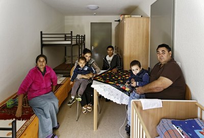 Syrische Familie im August 2014 in der Flüchtlingsunterkunft in Stuttgart-Plieningen.