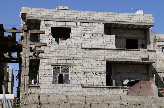 In Jaramana wohnen viele seit über zehn Jahren in unfertigen Häusern. Sie hoffen, bald in ihre Heimatregionen zurückkehren zu können. Foto: Yara E.