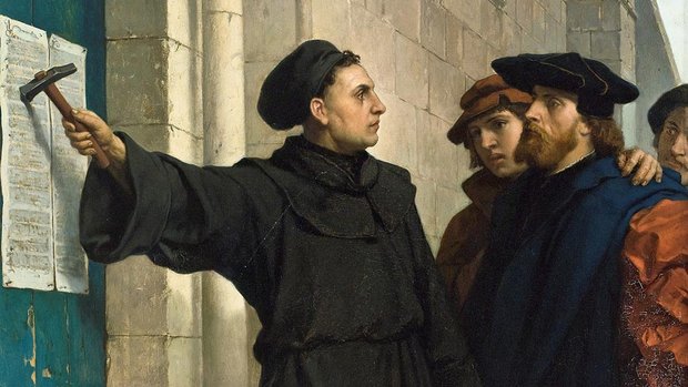 Umstritten, ob das so wirklich stattgefunden hat: Luther schlägt seine 95 Thesen an die Schlosskirche in Wittenberg. Foto: gemeinfrei