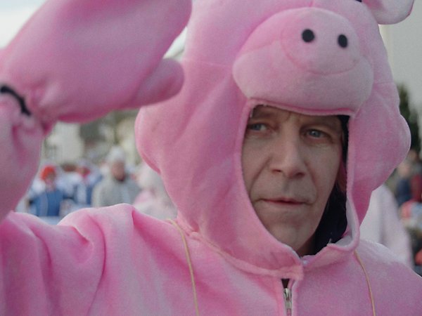 Auf einer Demo gegen die Sauereien beim Fleischproduzieren.